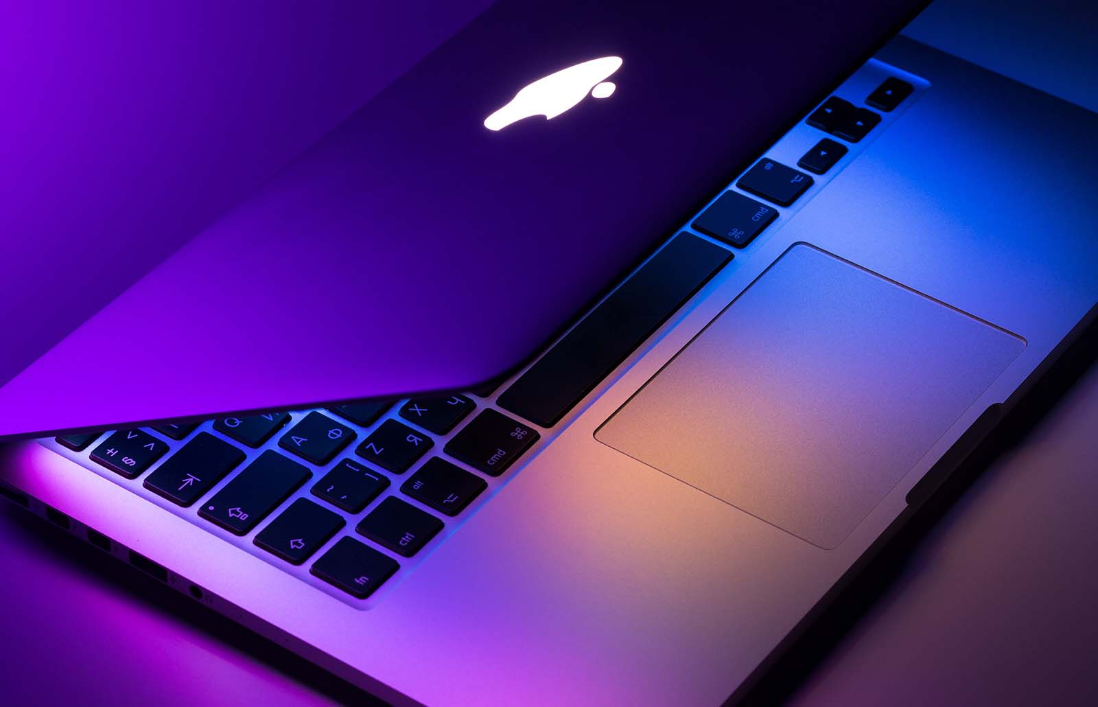A laptop partially closed.